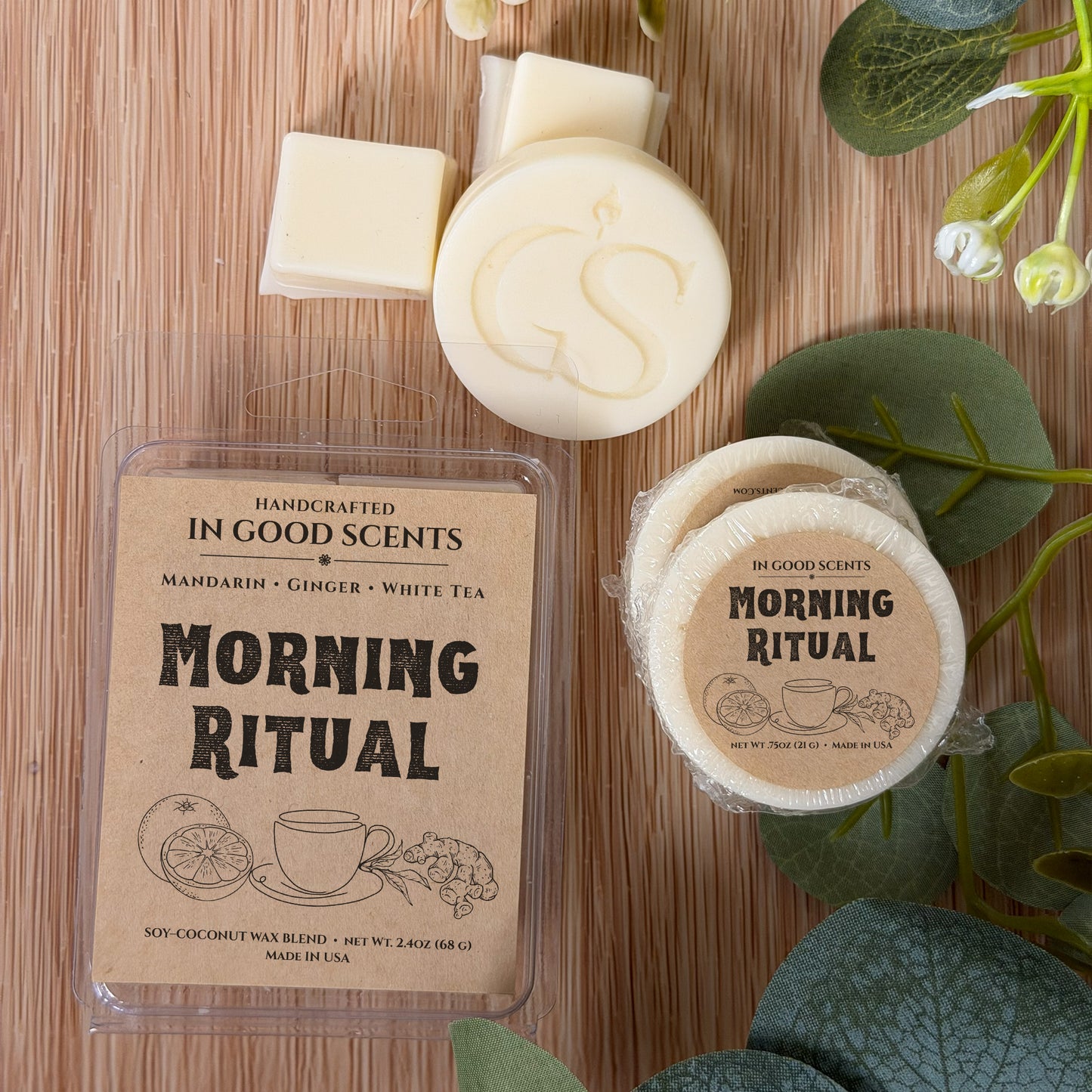 Handcrafted wax melts with 'Morning Ritual' packaging on a wooden surface with greenery.