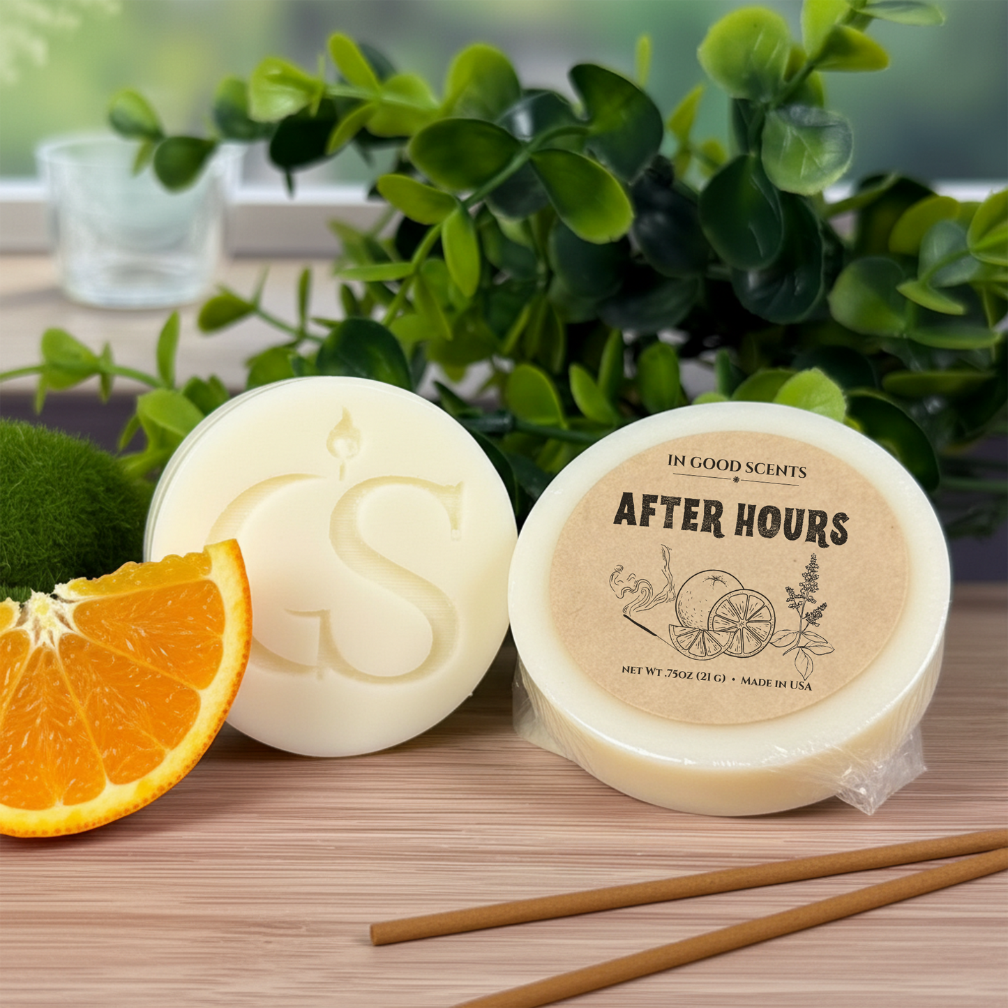After Hours wax melt tart (0.75 oz) with kraft label, shown beside an embossed “GS” tart, orange slice, and incense sticks on a wood surface.