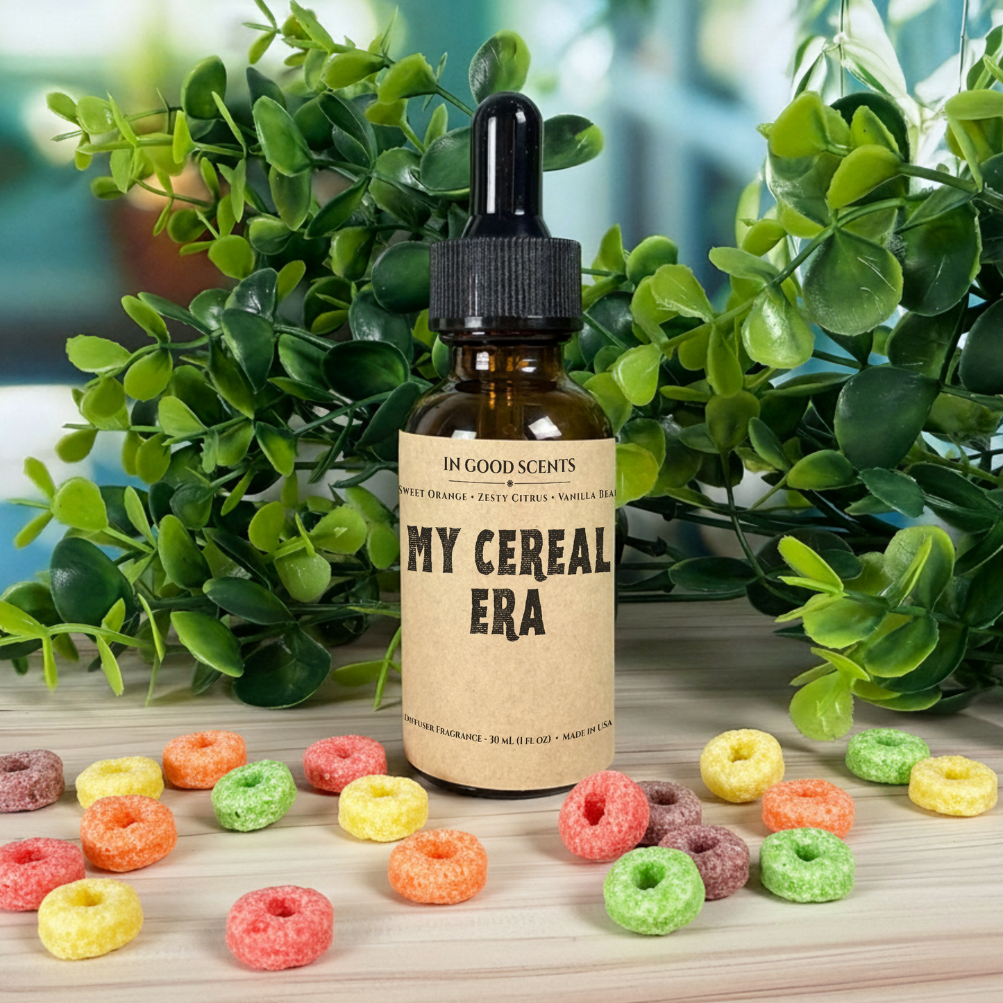 Bottle labeled 'My Cereal Era' with colorful cereal loops on a wooden surface with greenery in the background