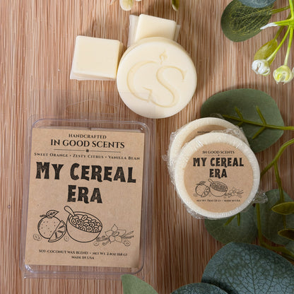 Handcrafted Wax Melts with 'My Cereal Era' packaging on a wooden surface with greenery.