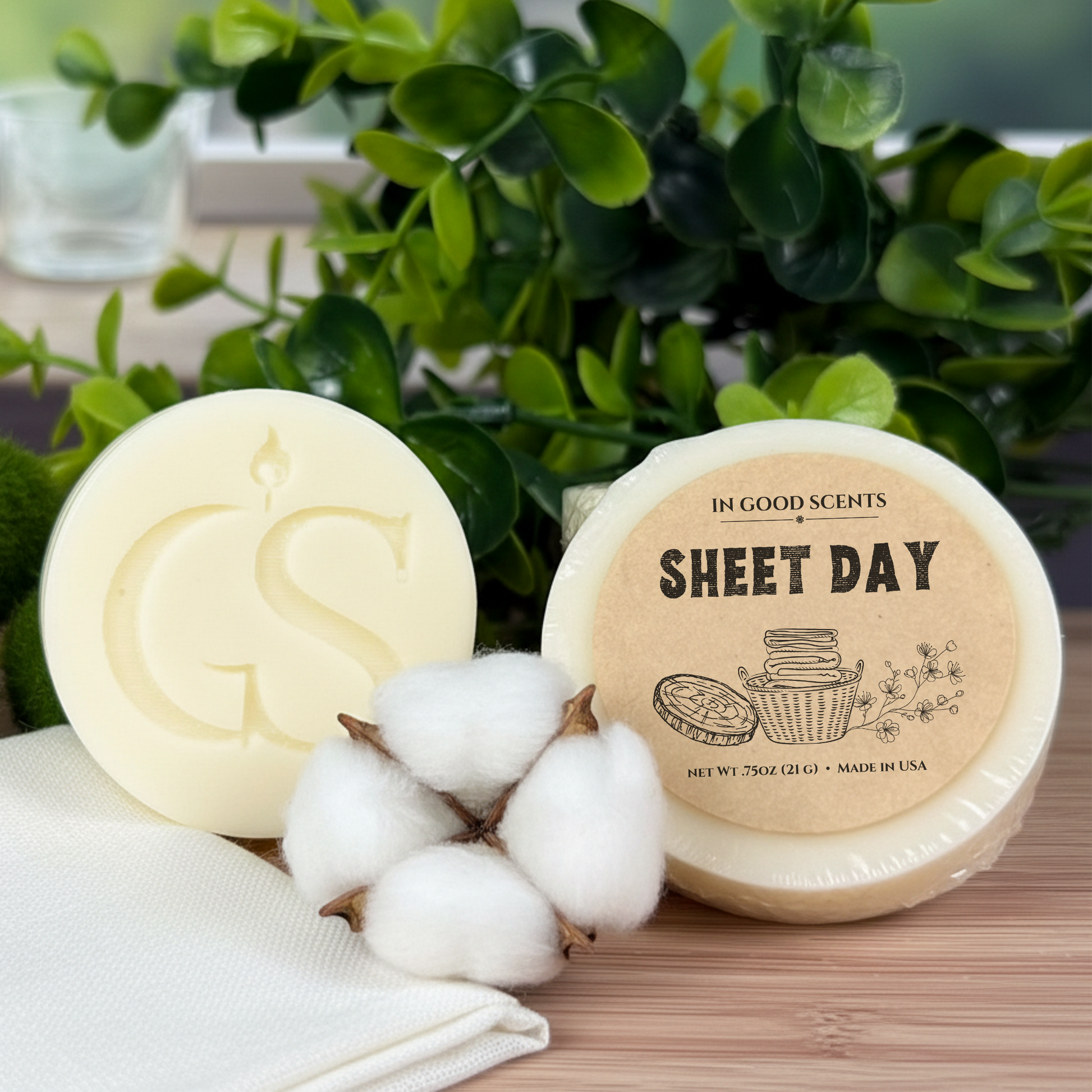 In Good Scents “Sheet Day” wax melt tart (0.75 oz) with GS logo melt, cotton decor, and greenery background